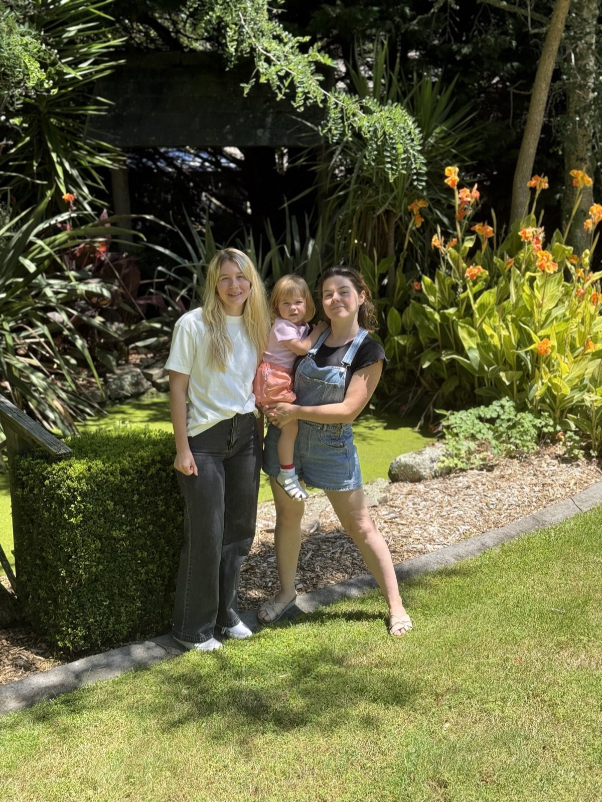 Lisa with family in a garden